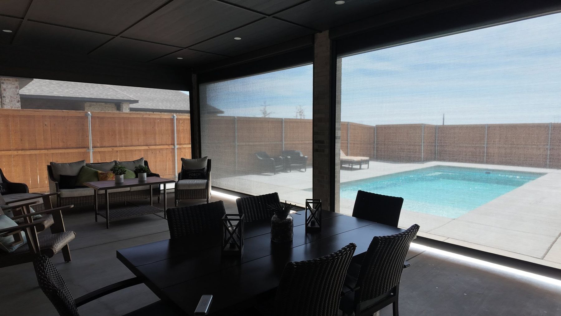 Pool view through lowered screens