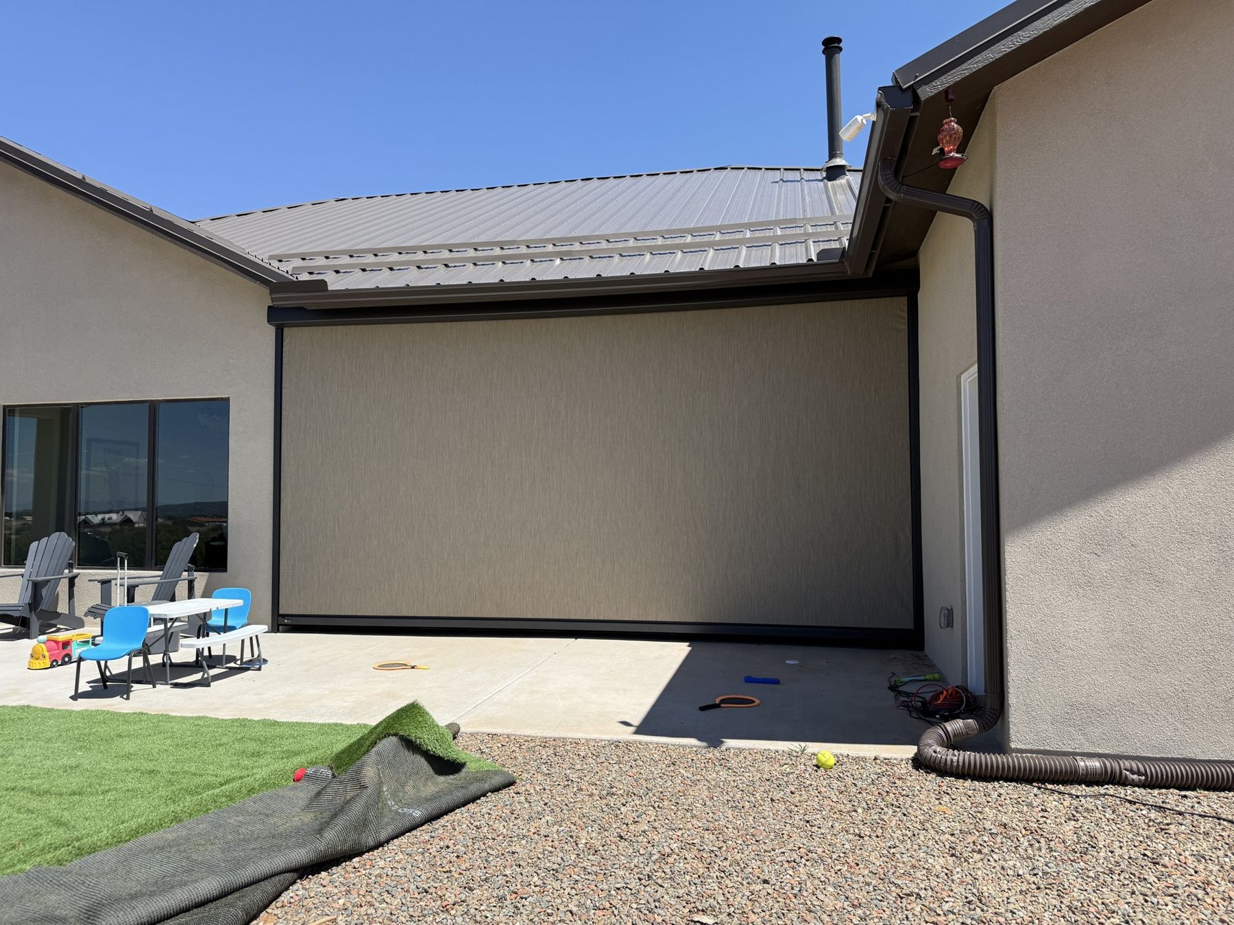 Large screen on a stucco home