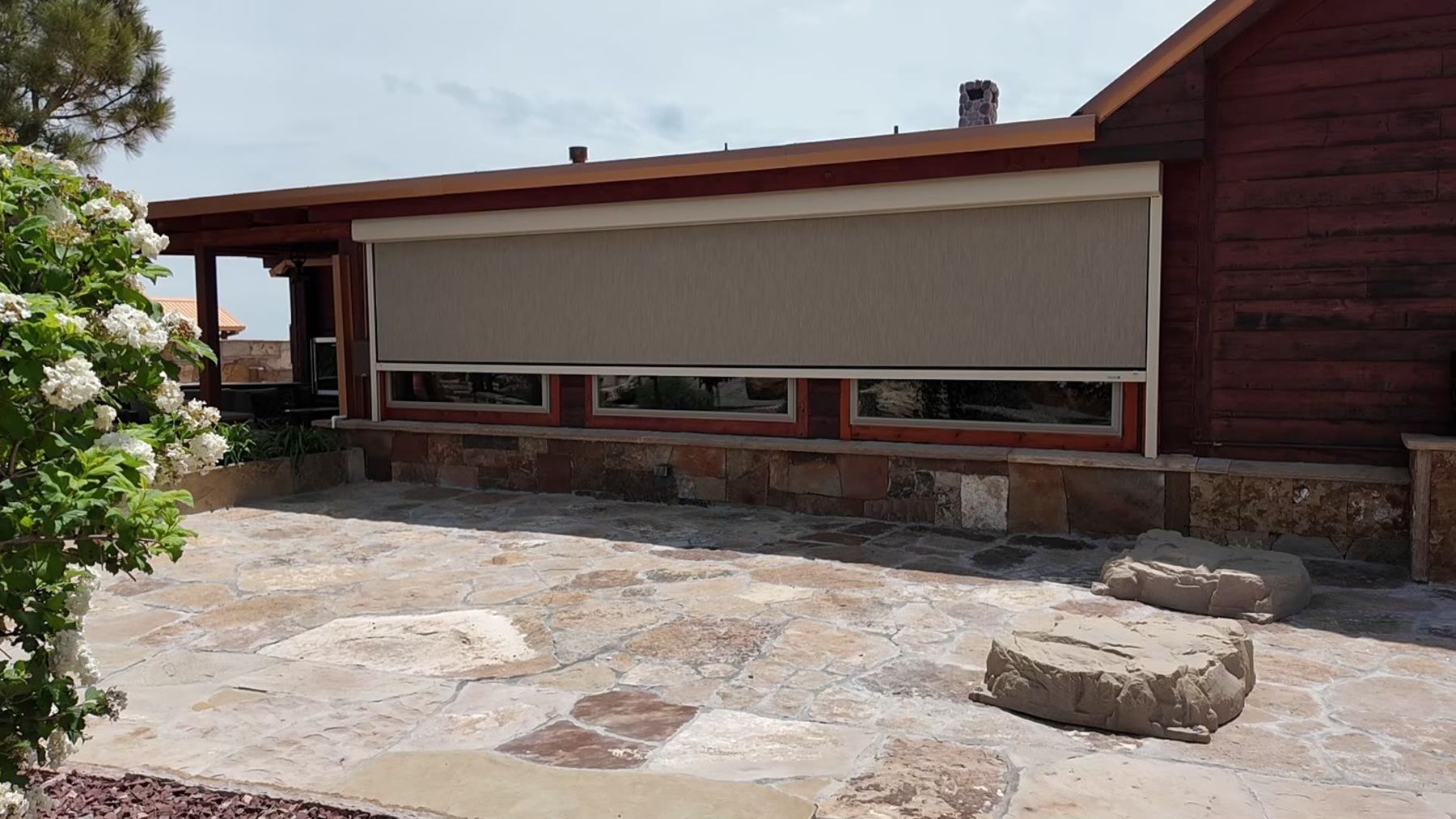 Screen over a flagstone patio