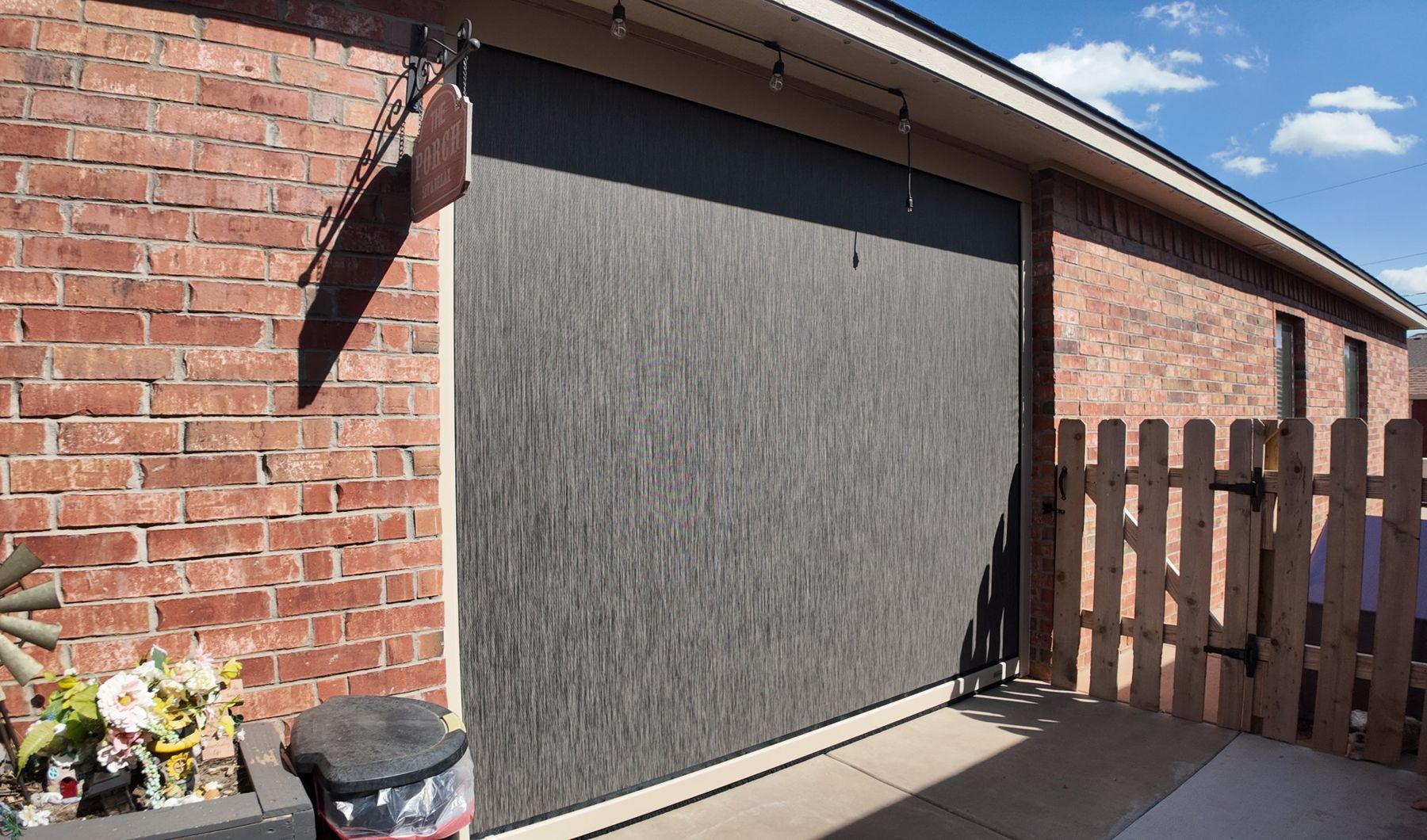 Screen on a small brick porch