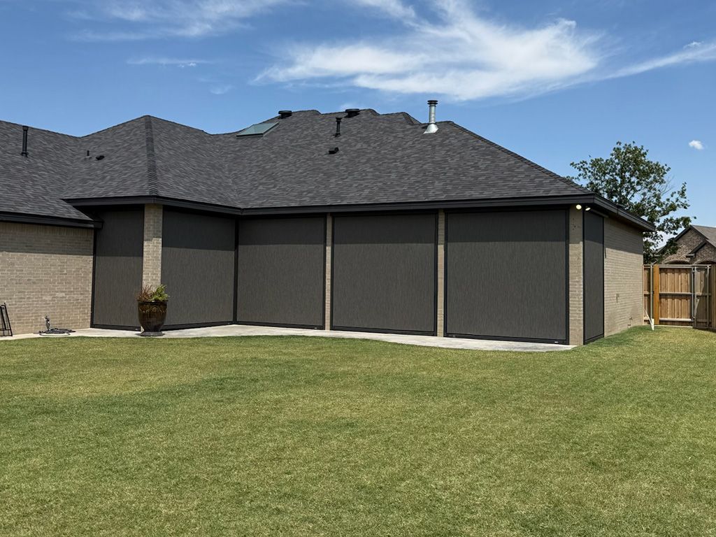 Patio enclosed by MagnaTrack screens